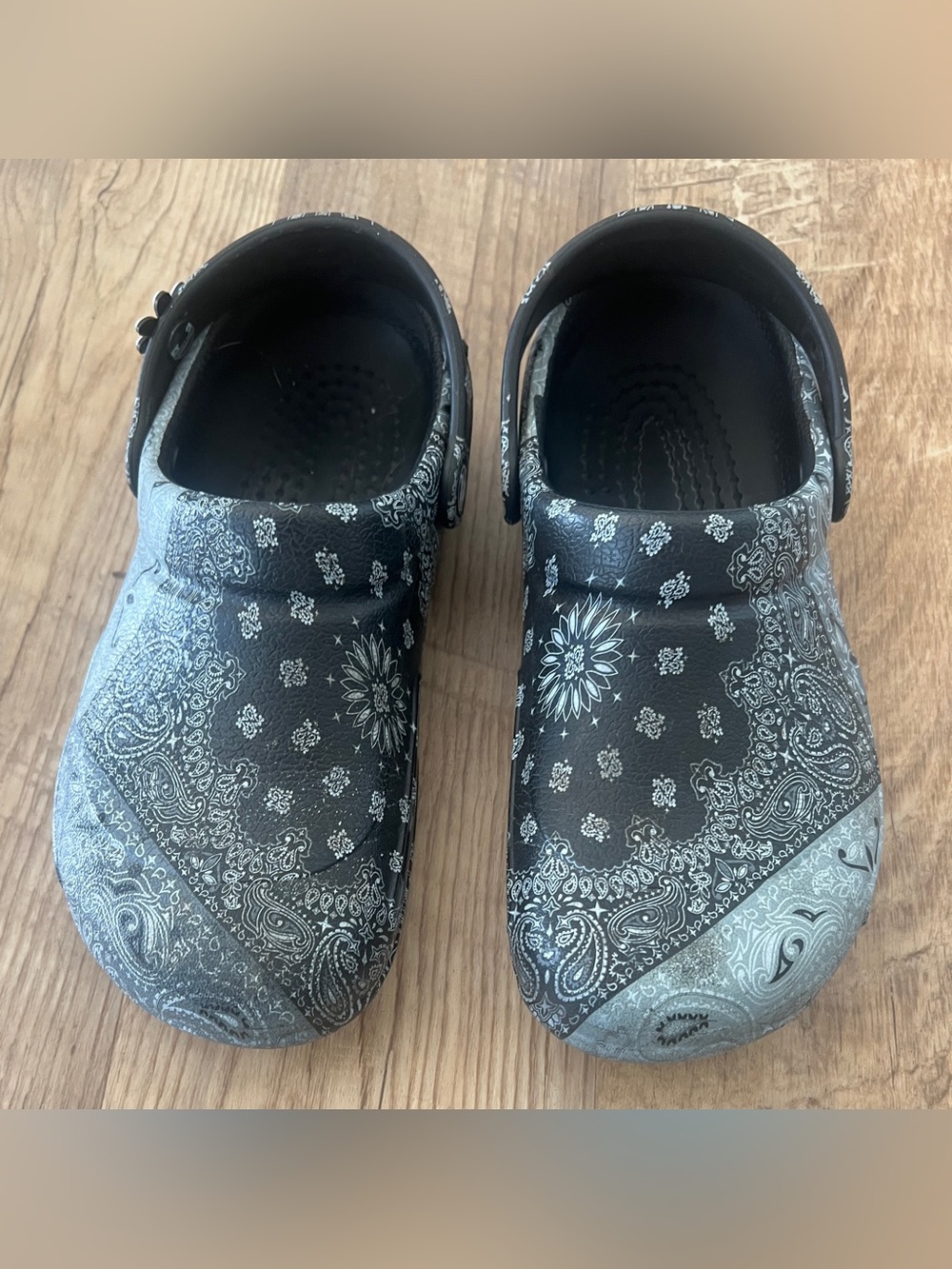 Crocs Bistro work clogs featuring a black and gray paisley design